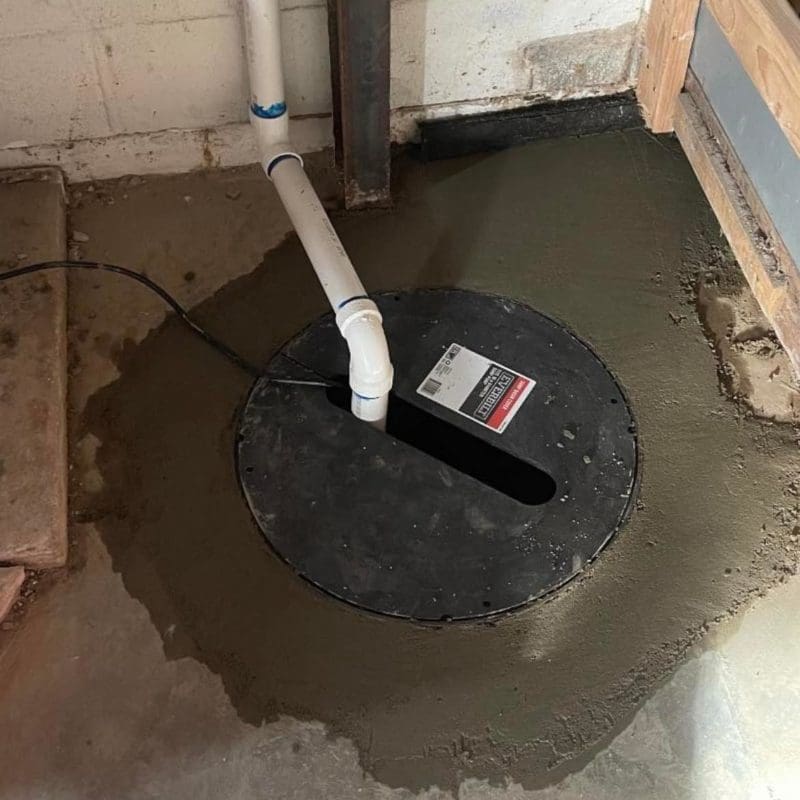 Basement waterproofing system and sump pump protecting Kansas City home foundation